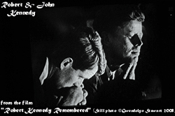 Photograph of a frame of 
the film ROBERT KENNEDY REMEMBERED, by Charles Guggenheim, with Robert F. 
Kennedy (L) & John F. Kennedy (R); still photograph of the frame by GWENDOLYN 
STEWART c. 2009; All Rights Reserved